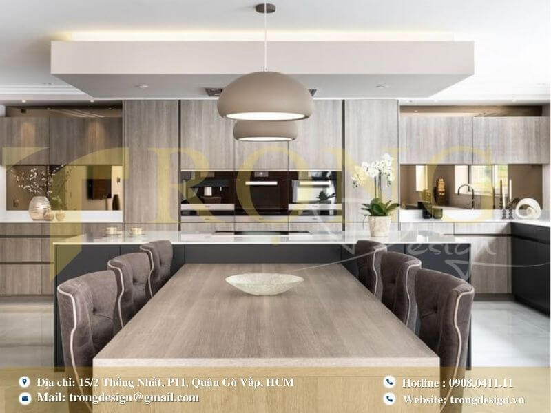 Bếp dạng thẳng kết hợp đảo bếp và chú trọng vào ánh sáng trang trí.