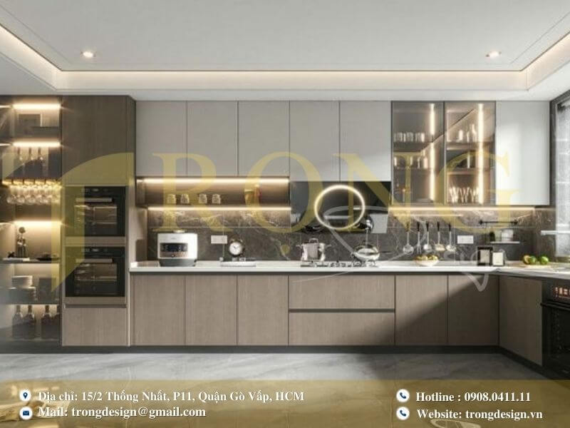 Bếp hiện đại với tủ bếp màu trắng và xám, mặt bếp màu đen và bàn ăn nhỏ.