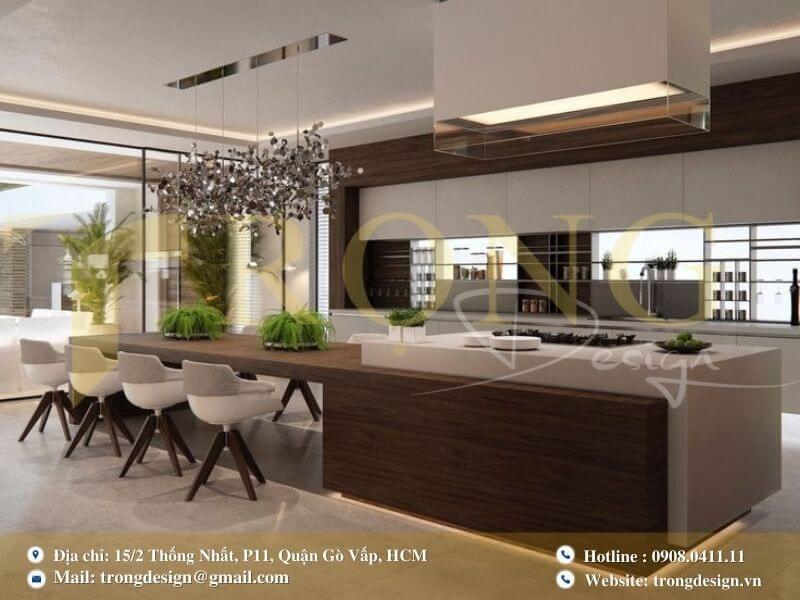 Bếp hiện đại với tủ bếp màu xám bóng, mặt bếp màu đen và sàn lát gạch trắng.