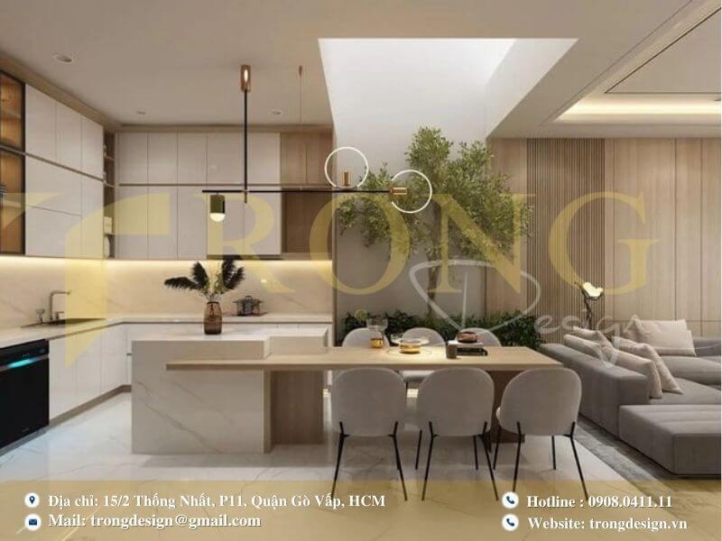 Phòng bếp tươi sáng, hiện đại với ánh sáng tự nhiên và cây xanh.