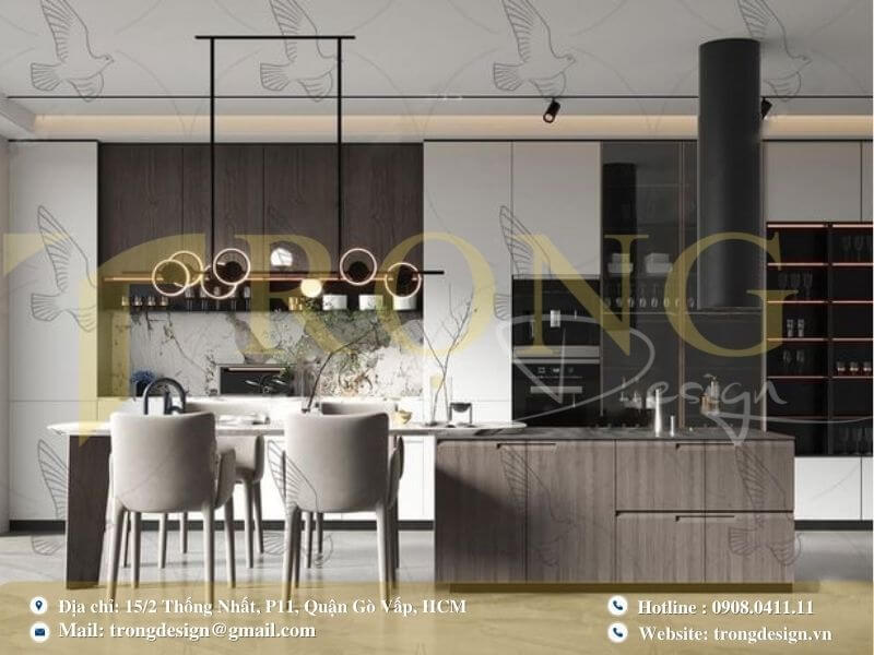 Bếp hiện đại với đảo bếp tích hợp bàn ăn và thiết kế đèn độc đáo.