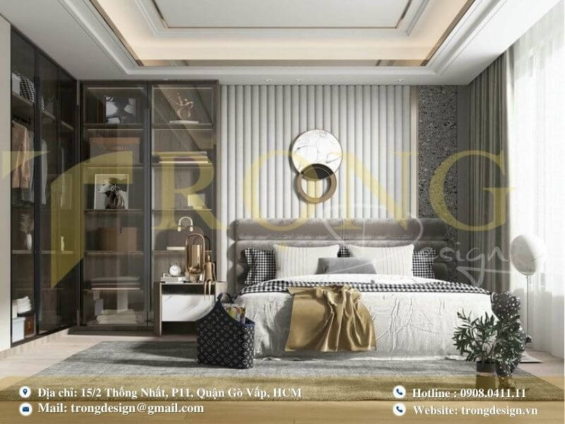 Phòng ngủ hiện đại, thanh lịch với tủ quần áo kính và chi tiết trang trí tinh tế.