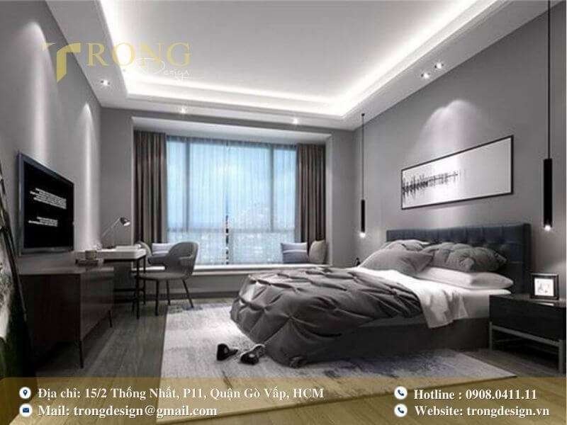 Phòng ngủ hiện đại, tối giản với tông màu xám và ánh sáng tự nhiên.