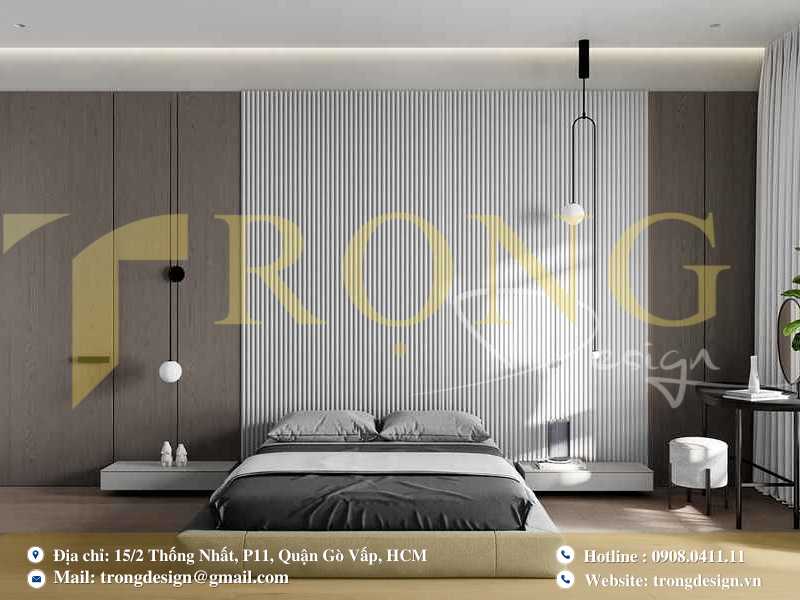 Phòng ngủ tối giản với ốp gỗ tinh tế và nội thất gọn gàng, kết hợp đèn LED ấm áp.