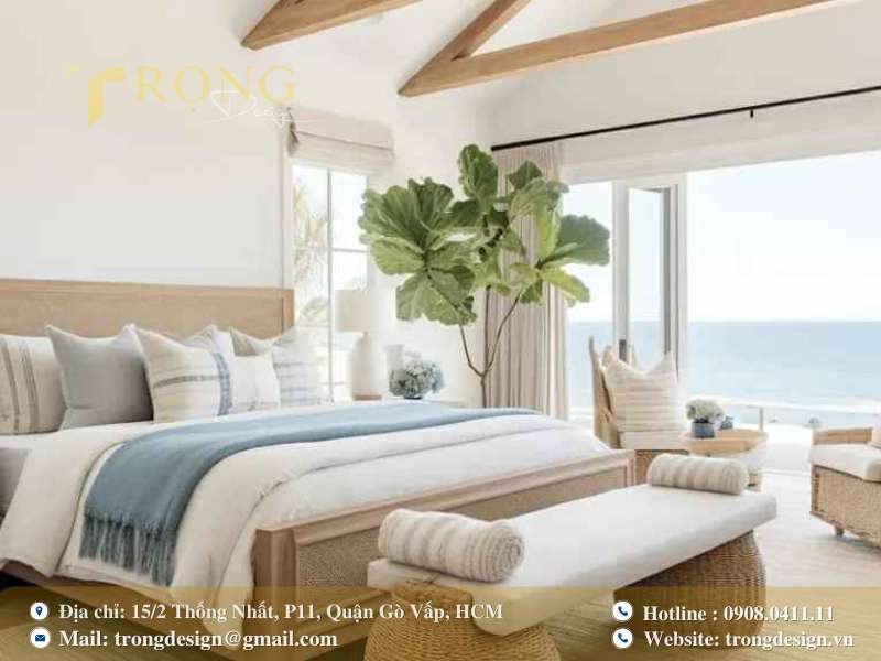 Không gian Coastal nhẹ nhàng với gỗ sáng, vải thô, xanh dương nhạt và cảm giác thư giãn như đang ở resort.