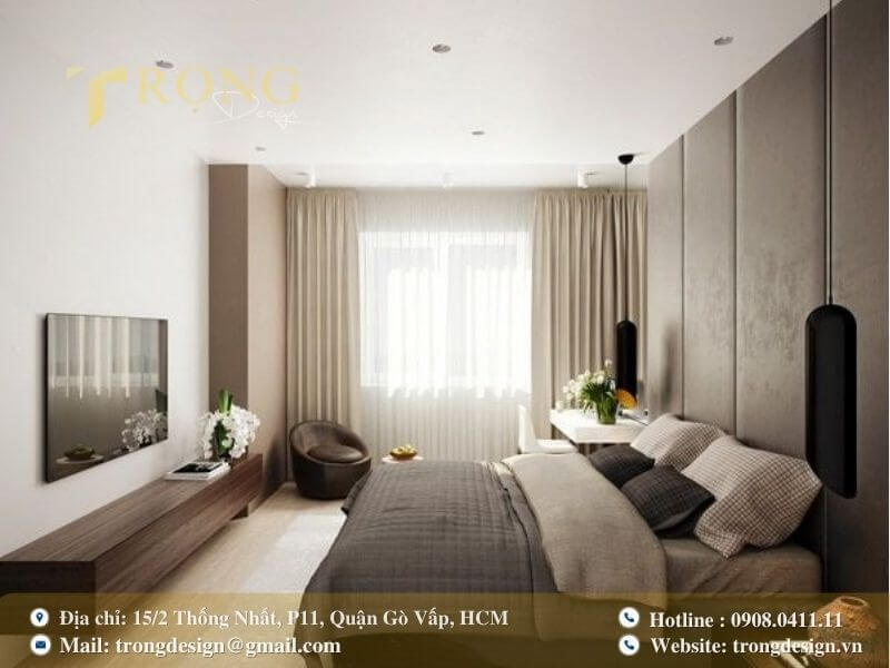 Phòng ngủ hiện đại, tối giản với tông màu nâu xám và ánh sáng tự nhiên tối ưu.