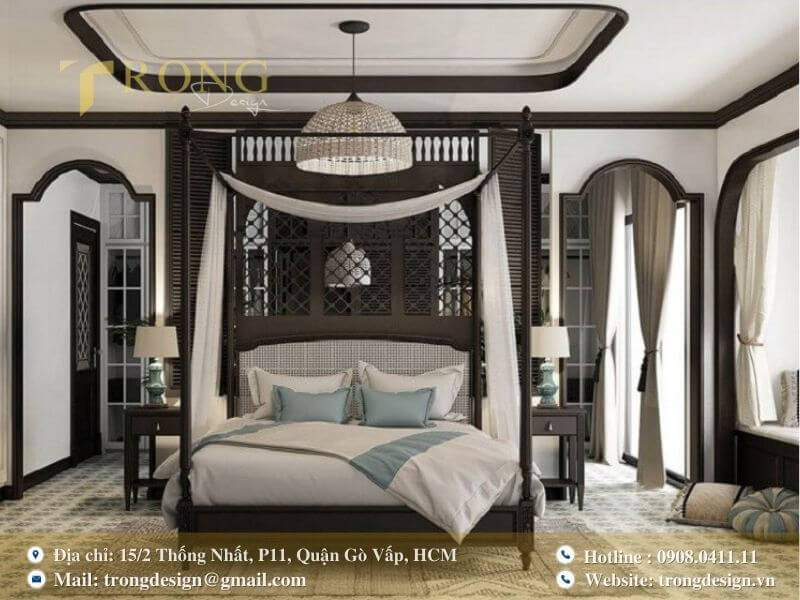 Phòng ngủ Indochine lãng mạn với chi tiết chạm khắc truyền thống.
