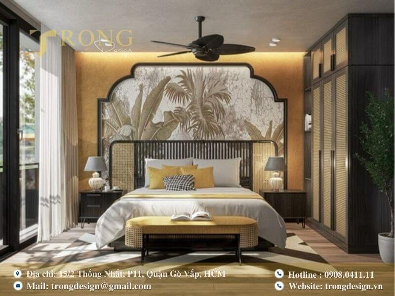Phòng ngủ Indochine hiện đại, tươi sáng với tông màu vàng cam.