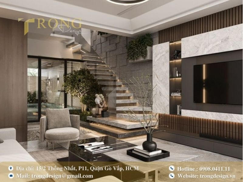 Phòng khách hiện đại, sáng tạo với cầu thang mở và tiểu cảnh xanh.
