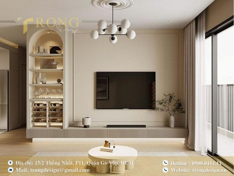 Phòng khách hiện đại, thanh lịch với phào chỉ và tủ rượu vòm.