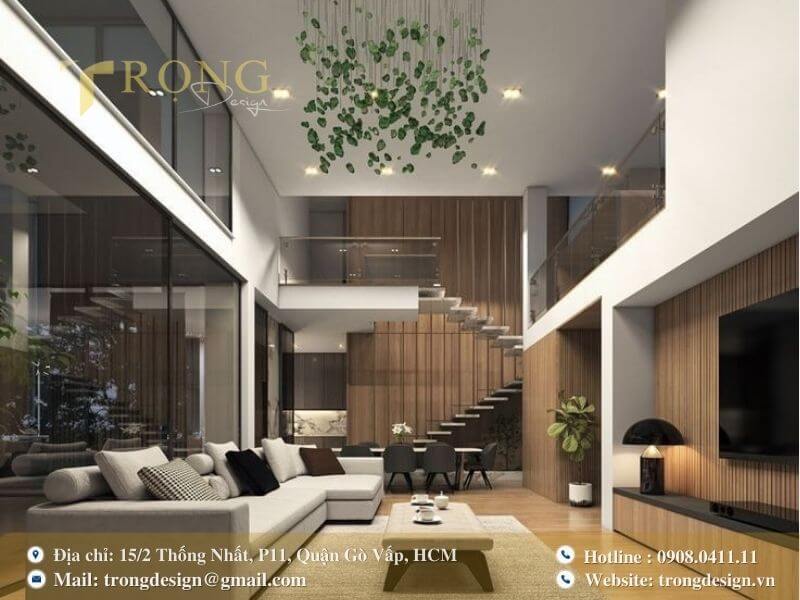 Phòng khách hiện đại với trần cao và sự kết hợp của gỗ ấm áp cùng kính.
