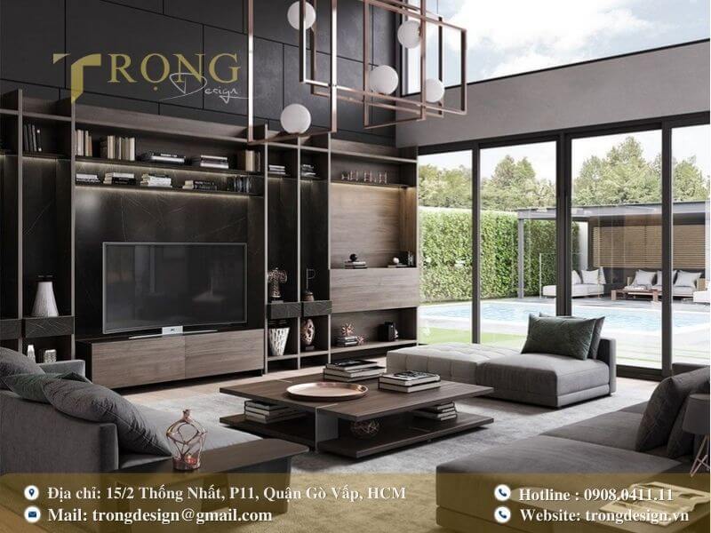 Thiết kế phòng khách mạnh mẽ, cá tính với tông màu tối và nội thất hiện đại.