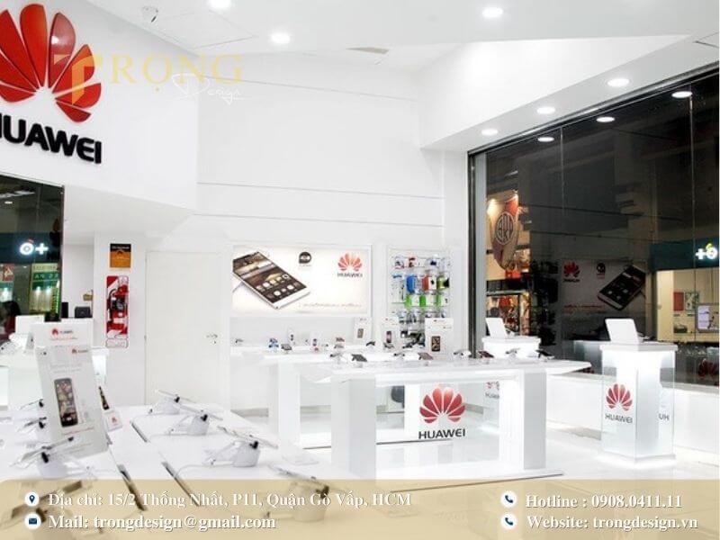 Showroom tông trắng chủ đạo, nổi bật sự tinh tế và nhận diện thương hiệu mạnh mẽ.