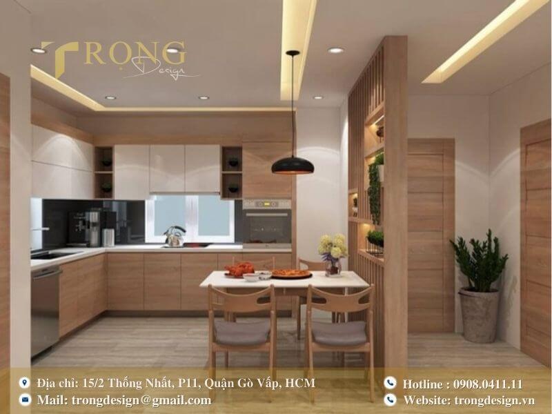 Bếp ấm cúng với sự kết hợp hài hòa giữa chất liệu gỗ và màu trắng.