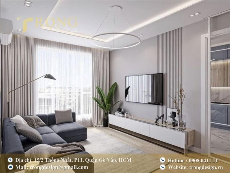 Phòng khách tối giản với tông màu xám và trắng, kết hợp với các chi tiết gỗ tinh tế.