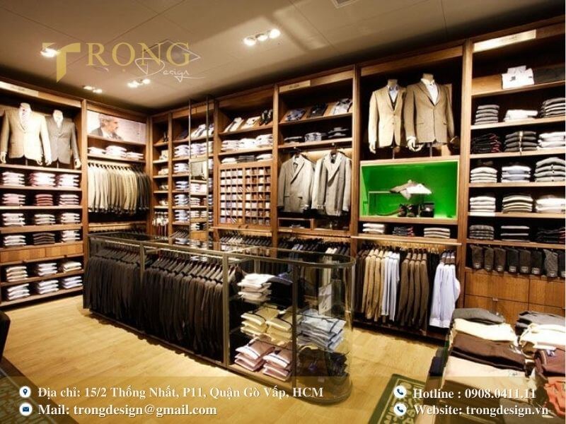 Không gian cửa hàng chuyên nghiệp với nội thất gỗ, trưng bày các mẫu vest nam.